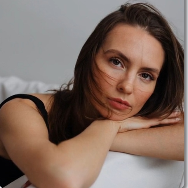 couple facing away from each other looking stressed, relationship tension, emotional distance, professional photography, muted colors